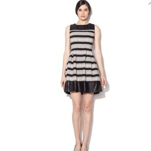 Gorgeous Rinascimento dress with imitation leather